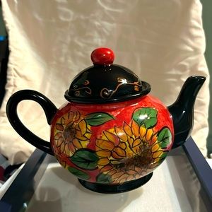 Bella Casa by Ganz A trio of sunflower heads, burnt orange background